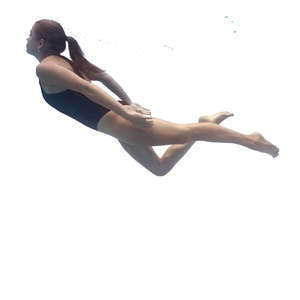 woman swimming under water