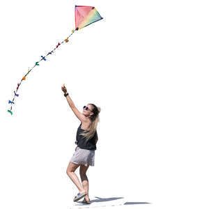 young woman flying a kite