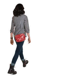 woman in a plaid shirt walking