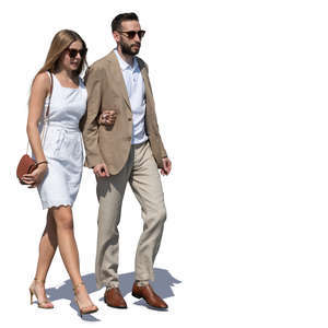 man and woman in fancy summer outfits walking