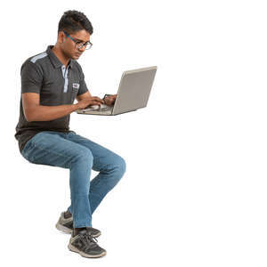 young man sitting and working