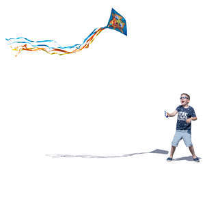 little boy playing with a kite