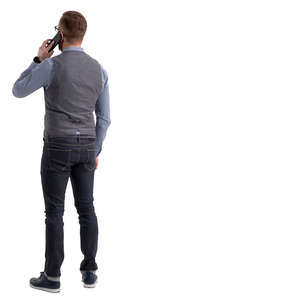 man standing and talking on the phone