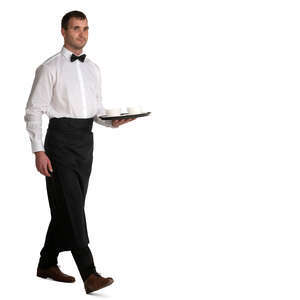 waiter in a black apron walking