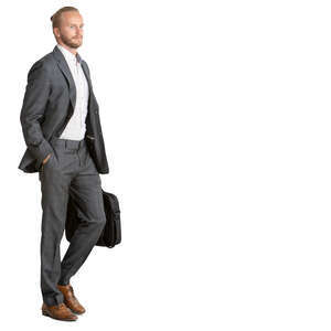 man in a grey suit walking