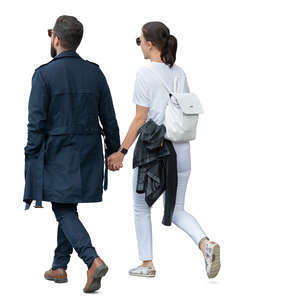 man and woman walking holding hands