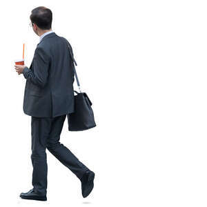 asian businessman with a coffee cup walking