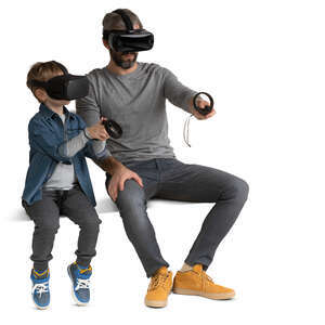 father and son playing VR games