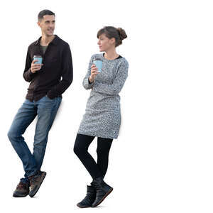 man and woman standing and drinking coffee