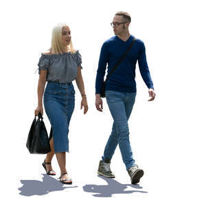 backlit man and woman walking