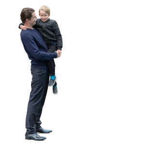 man standing and holding his son