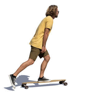 young man riding a longboard