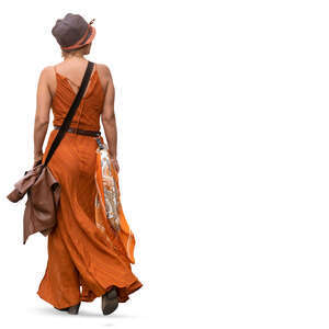 woman in a long orange dress walking