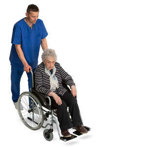 male nurse pushing an elderly lady in a wheel chair