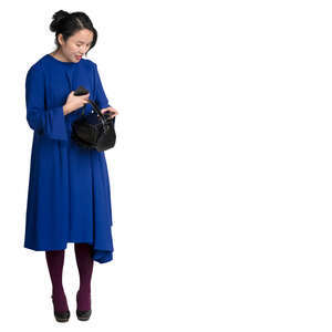 asian woman in a blue dress standing