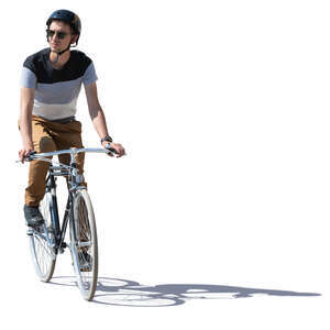 young man with a helmet riding a bike