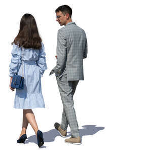 man and woman walking on a summer day