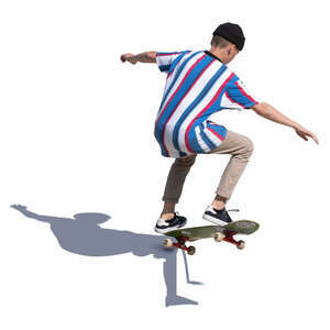 young man doing a stunt on a skateboard