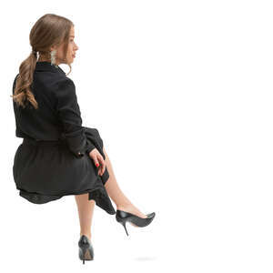 woman in a formal black dress sitting