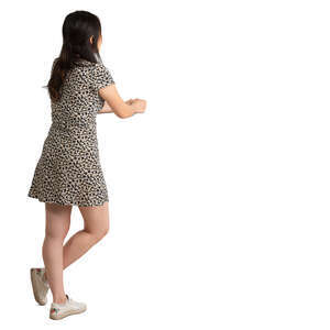 young woman standing and leaning on a counter