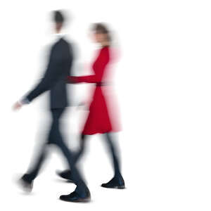 motion blur image of a man and woman walking