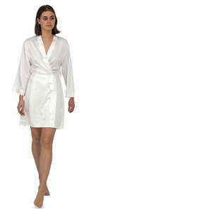 woman in a white silk bathrobe walking