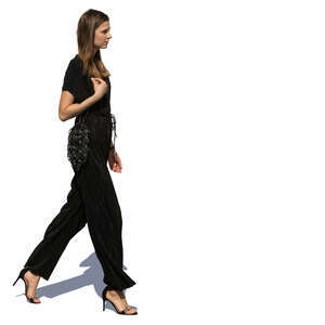 woman in a black jumpsuit walking