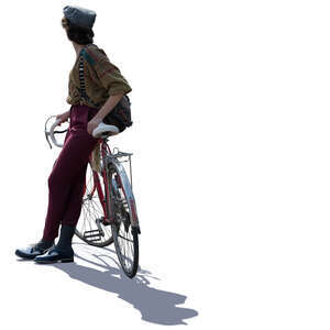 backlit woman leaning on a bike