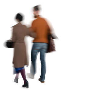 motion blur image of a couple walking arm in arm