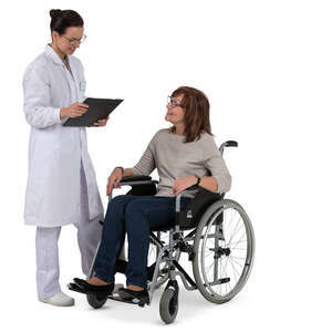 doctor talking to an older woman in a wheelchair