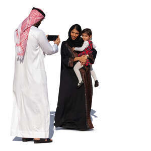 arab man taking a picture of his family