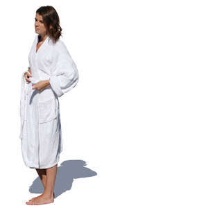 woman in a white bathrobe standing