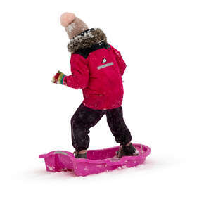 little girl sleighing in winter