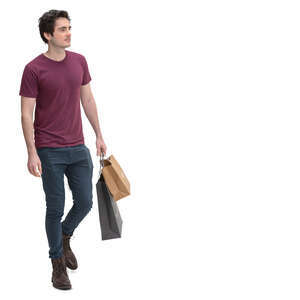 young man with shopping bags walking