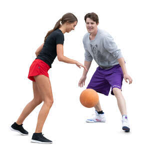 man and woman playing basketball