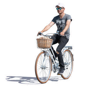 young man riding a white city bike