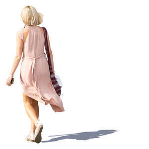 woman in a pale pink dress walking