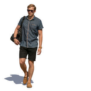 man in summer shorts walking on the street