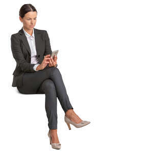 businesswoman sitting and texting