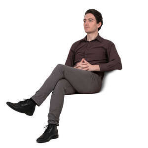 man sitting and looking into distance