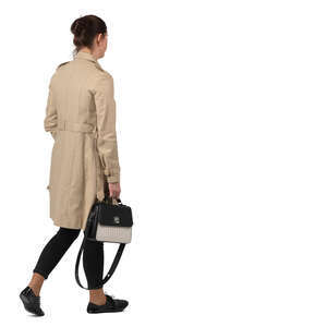 woman in a light overcoat walking