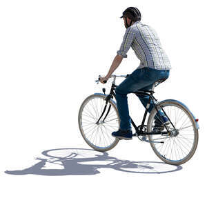 backlit man riding a bike