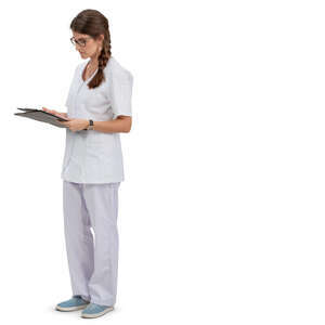 young nurse standing and reading some papers