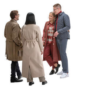 four people in overcoats standing and talking