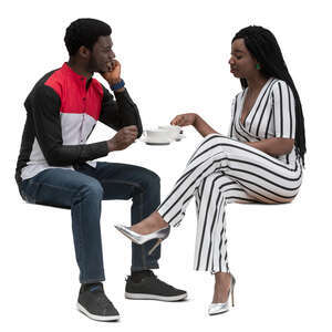 black man and woman sitting in a cafe and talking