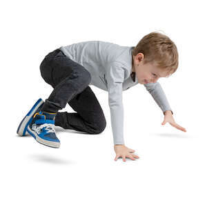 little boy playing on the floor