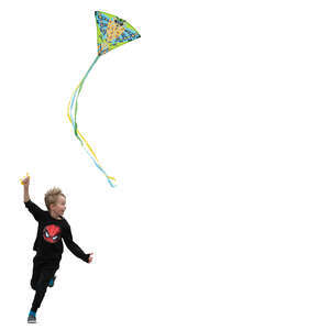 little boy running and flying a kite