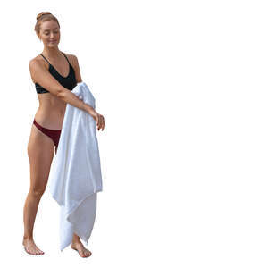 woman drying herself with a white towel