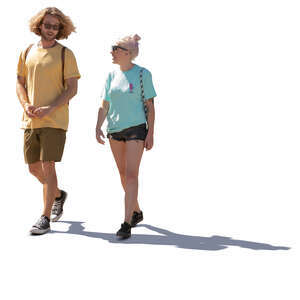 sidelit man and woman walking and talking