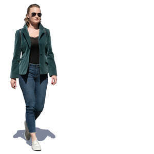 cut out woman in a green jacket walking